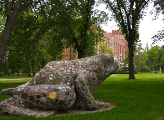 I've walked by the frog at the U of R College Avenue Campus many times, but I didn't realize all the detail on the sculpture until I walked up to it. But then I freaked out when a mouse scurried out from under it and that made me shriek, but I'm not afraid of squirrels or gophers, so why would I get freaked out by a tiny mouse?  That's my deep thought o the day. :) 