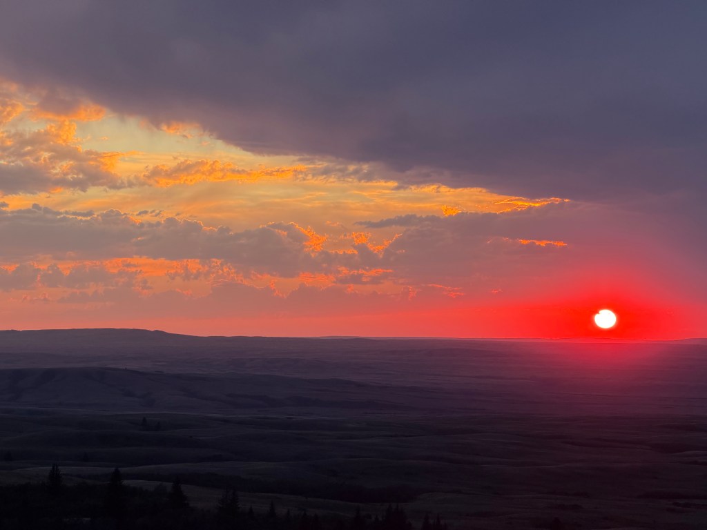 setting sun on the horizon Bald Butte, Cypress Hills, Saskatchewan